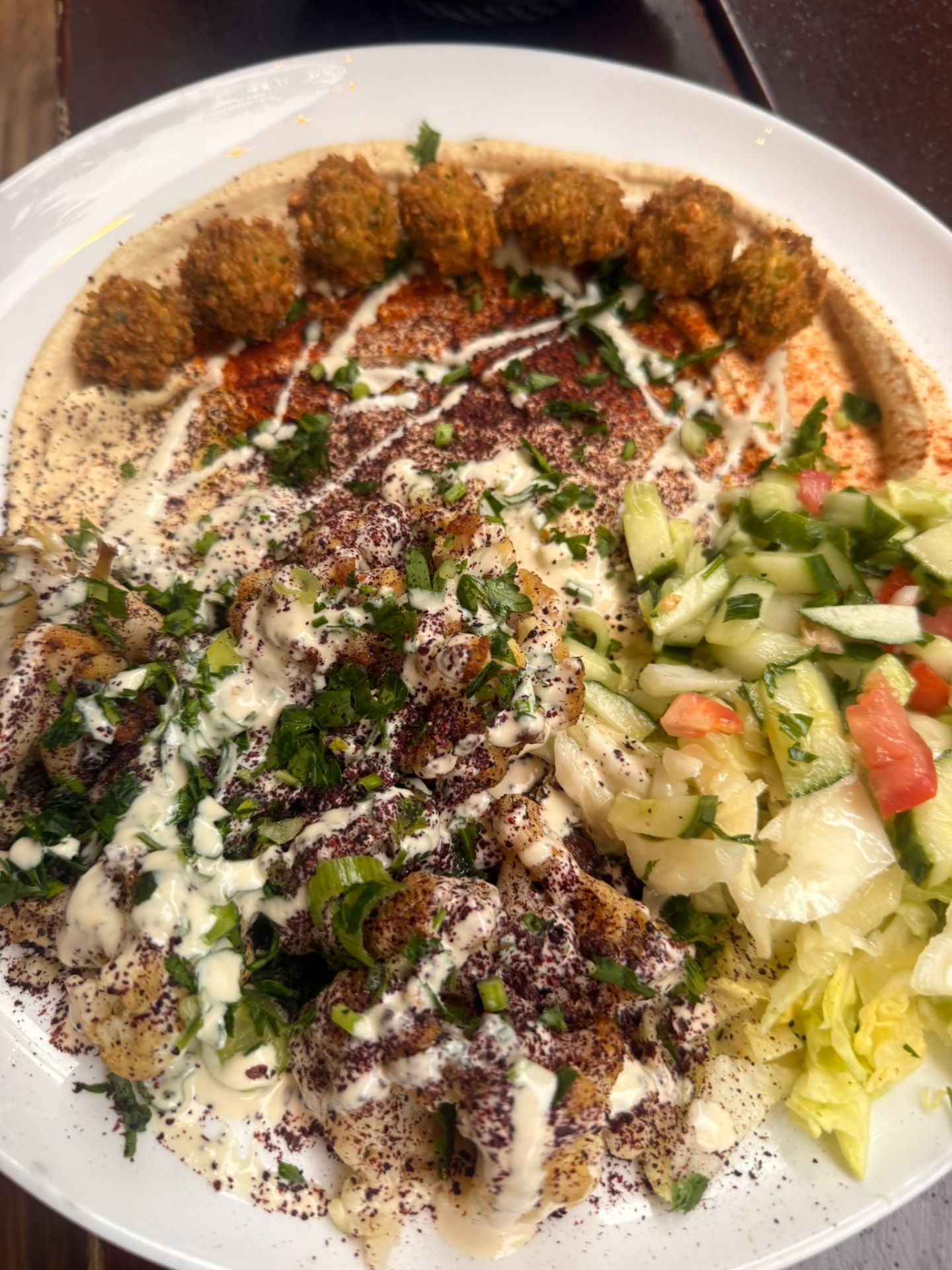Blumenkohl Sababa with roasted cauliflower, hummus and falafel